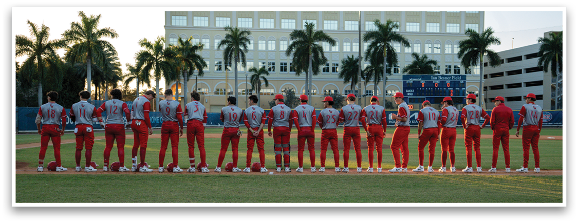 A group of baseball players in red and white uniforms are standing on a field. AI generated content