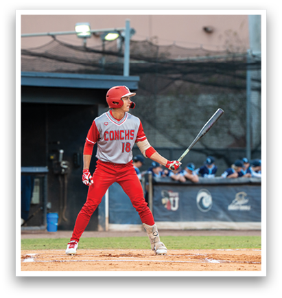 A baseball player in a red uniform is swinging a bat on a field. AI generated content