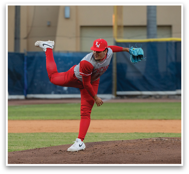 A baseball player in a red uniform is pitching a ball on a field. AI generated content