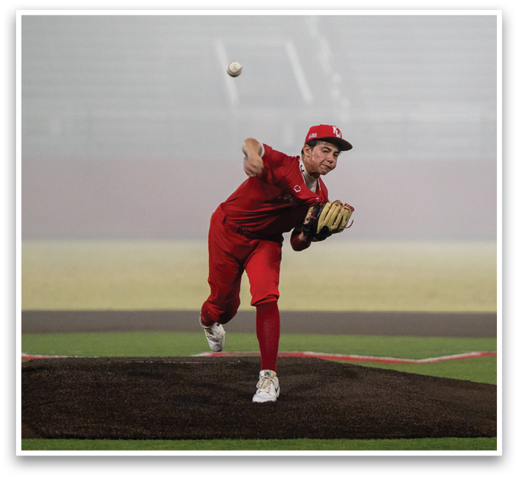 A baseball player in a red uniform is pitching a ball on a field. AI generated content
