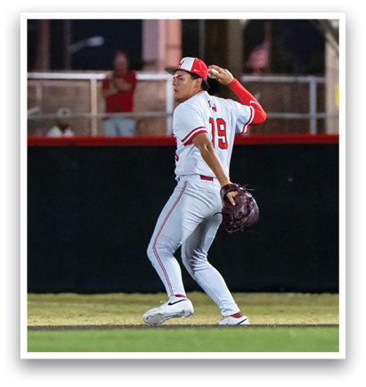 A baseball player in a white uniform is standing on the field, wearing a glove and preparing to throw the ball. AI generated content