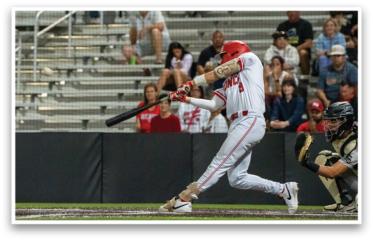 A baseball player is swinging a bat at a ball during a game. AI generated content