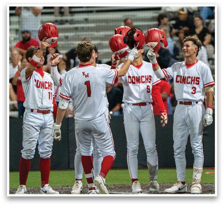 Baseball players wearing red and white uniforms celebrating a win. AI generated content