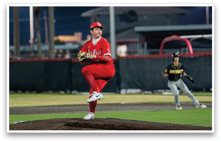 A baseball player in a red uniform is pitching a ball on a field. AI generated content