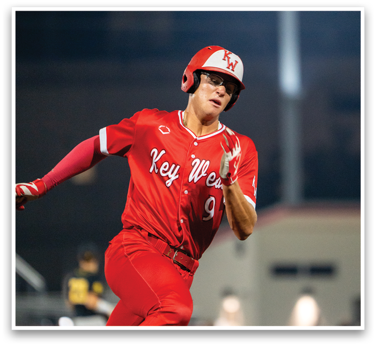 A baseball player in a red uniform is running on the field. AI generated content