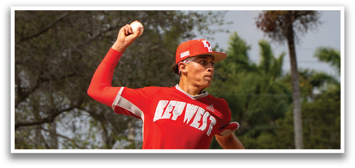 A baseball player in a red shirt and white pants is throwing a ball on a field. AI generated content