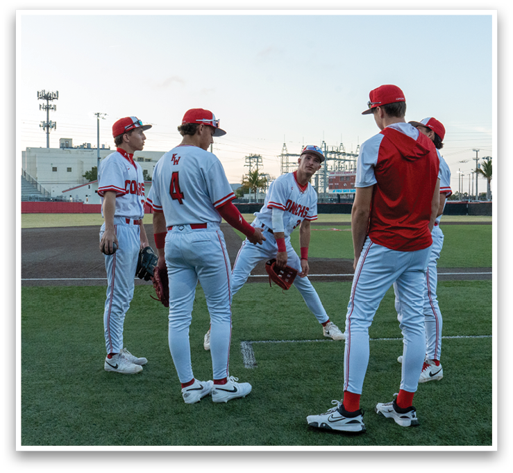 A group of baseball players standing on a field. AI generated content