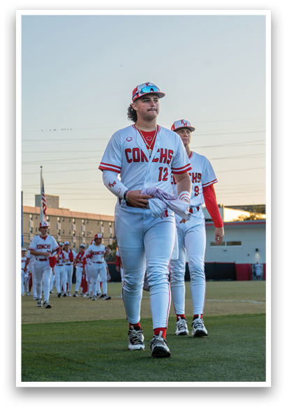 A group of baseball players walking on a field. AI generated content