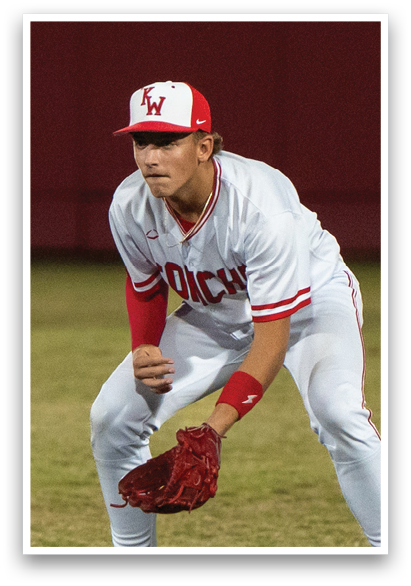 A baseball player in a white uniform is crouching on the field, holding a baseball glove. AI generated content