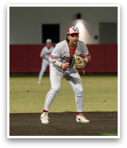 A baseball player in a white uniform is holding a glove, ready to catch the ball. AI generated content