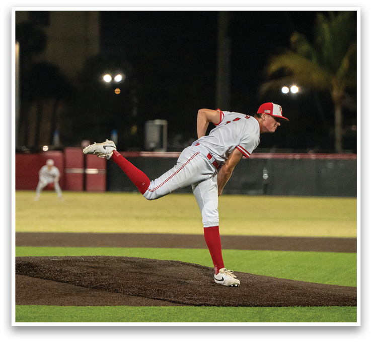 A baseball player in a white uniform is pitching a ball on a field. AI generated content