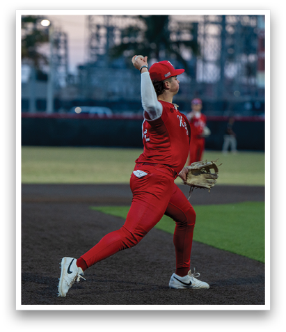 A baseball player in a red uniform is throwing a ball. AI generated content