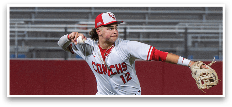 A baseball player in a white uniform is throwing a ball. AI generated content
