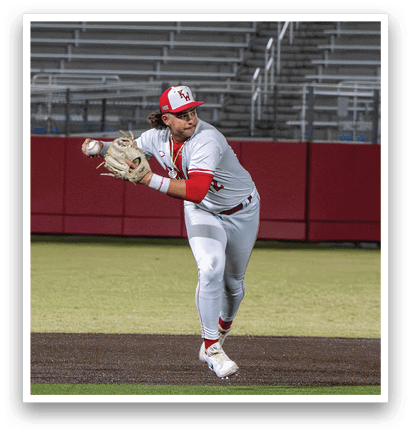 A baseball player in a white uniform is throwing a ball. AI generated content