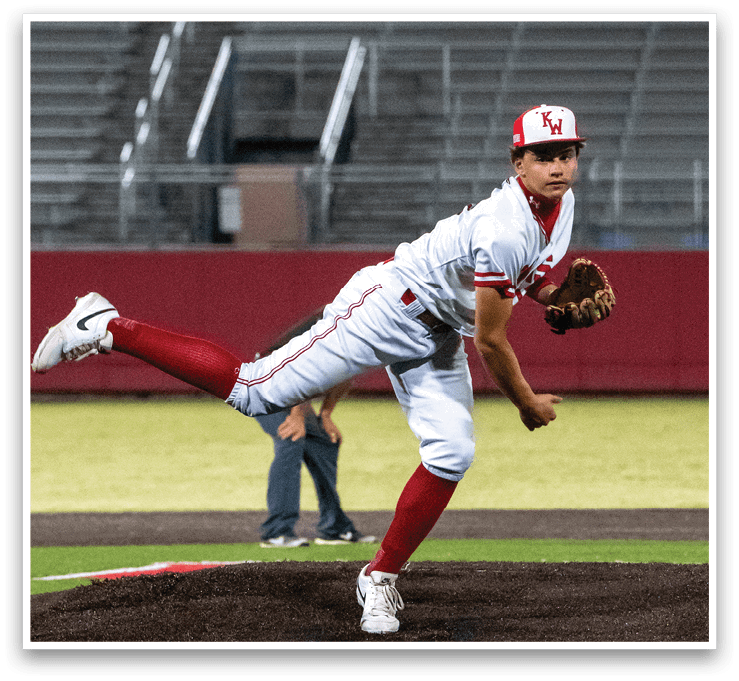 A baseball player in a white and red uniform is pitching a ball on a field. AI generated content