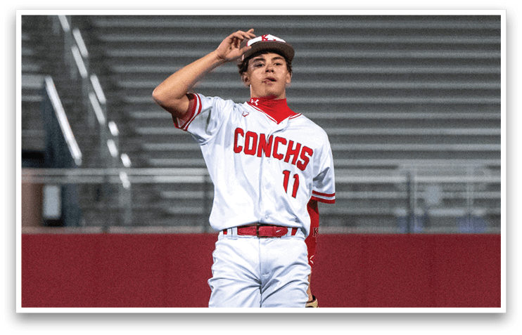 A baseball player wearing a white and red jersey stands on the pitcher's mound. AI generated content