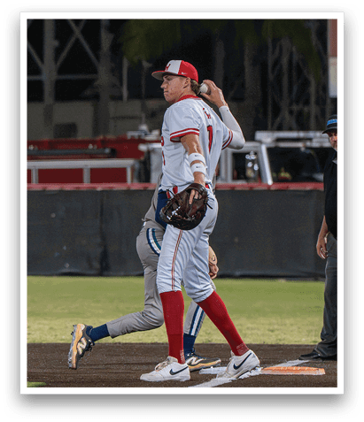 A baseball player in a red and white uniform is throwing a ball. AI generated content