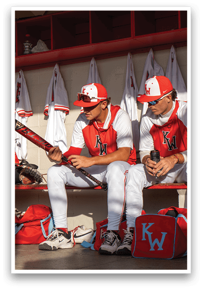 Two baseball players are sitting on a bench, one holding a bat and the other holding a baseball glove. AI generated content
