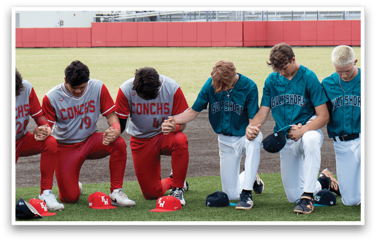 Baseball players from the Cougars team praying on the field. AI generated content