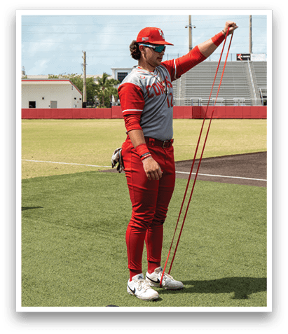 A baseball player in a red uniform holds a red ribbon in his hand. AI generated content