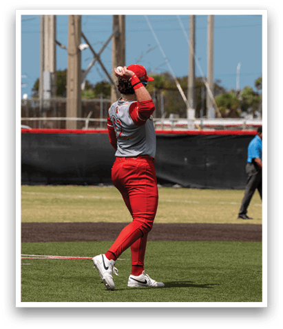 A baseball player in a red uniform is throwing a ball. AI generated content
