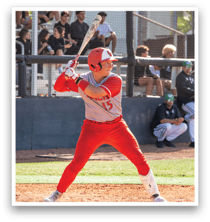 A baseball player in a red uniform is swinging a bat, preparing to hit the ball. AI generated content