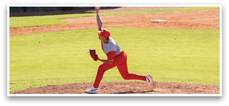 A baseball player in a red uniform is pitching a ball on a field. AI generated content