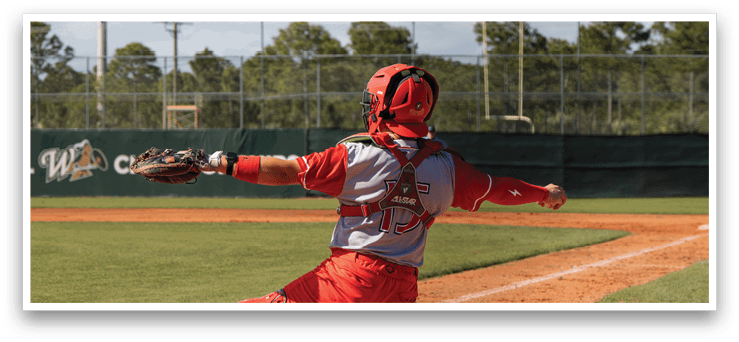 A baseball player in a red uniform is in the process of catching a ball. AI generated content