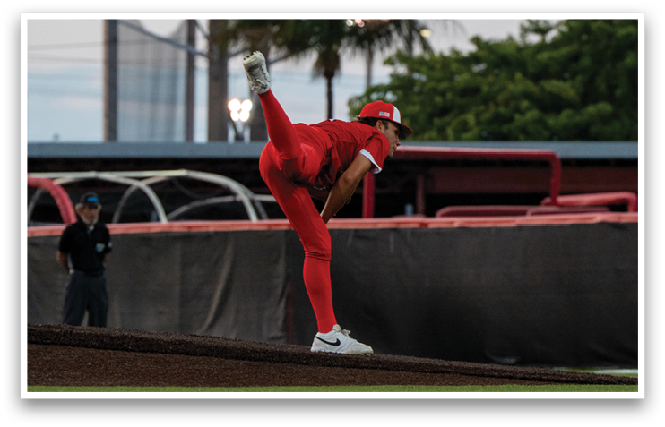 A woman in a red outfit is throwing a baseball on a field. AI generated content