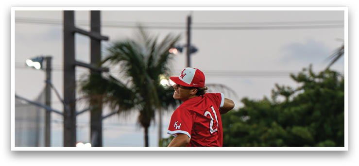 A baseball player in a red uniform is throwing a ball. AI generated content
