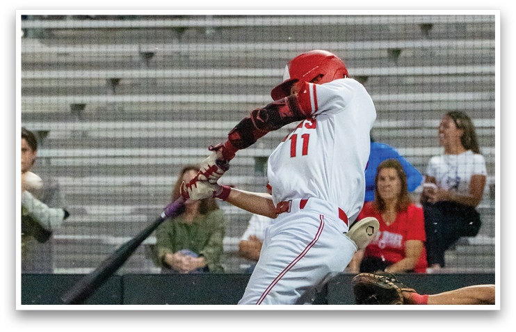 A baseball player is swinging a bat during a game. AI generated content