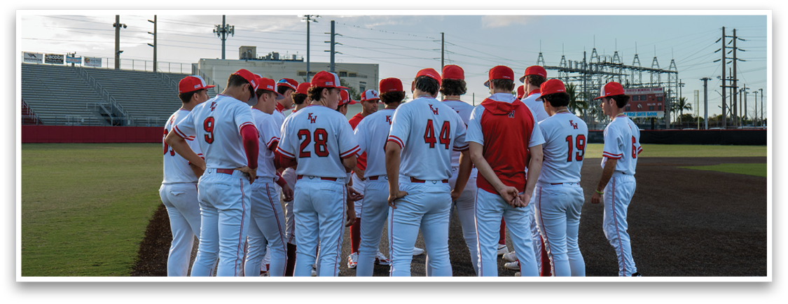 A group of baseball players wearing red hats and white uniforms are standing on a baseball field. AI generated content