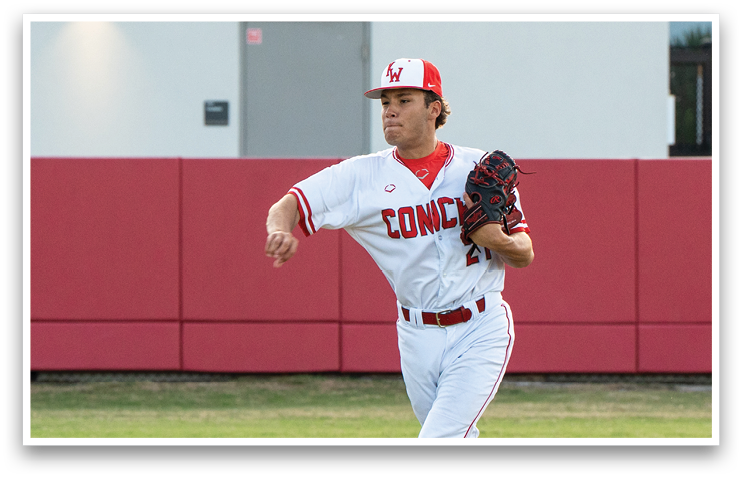 A baseball player in a white uniform is pitching a ball. AI generated content