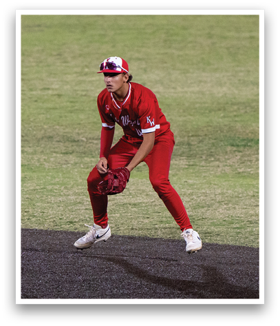 A baseball player in a red uniform is swinging a bat. Description generated by AI