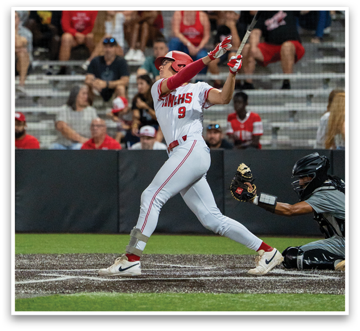 A baseball player is swinging a bat at a ball. Description generated by AI
