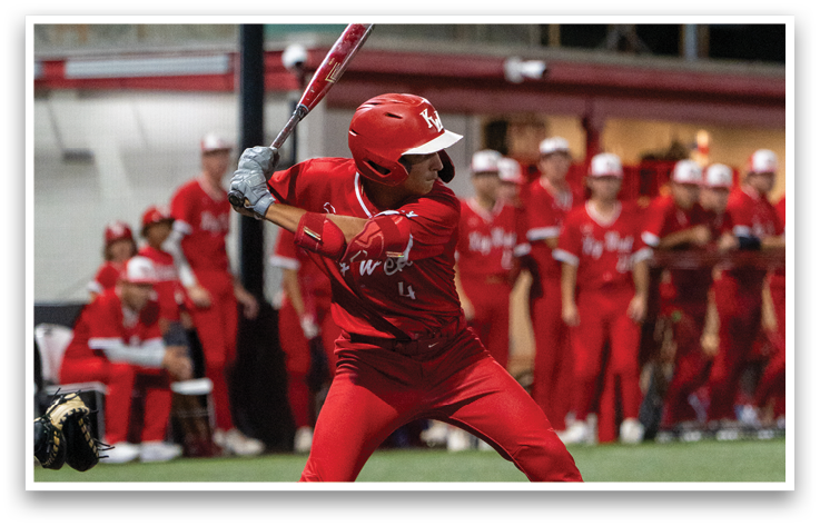 A baseball player in a red uniform is swinging a bat. Description generated by AI