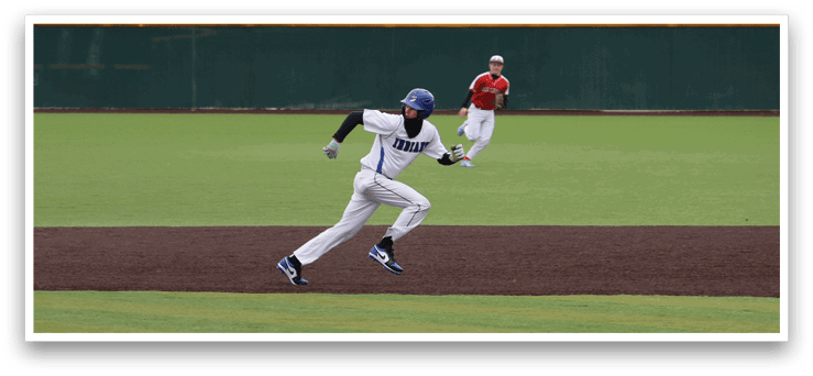 A baseball player is running towards a base while a catcher is trying to catch the ball. AI generated content