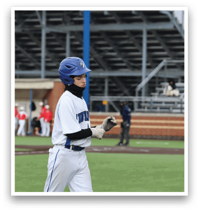 A baseball player wearing a blue helmet and white uniform walks across a field. AI generated content