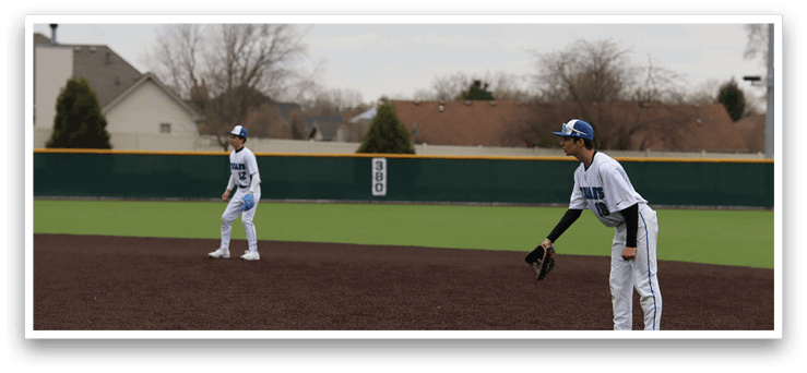 Two baseball players are standing on a field, one closer to the left and the other closer to the right. They are both holding baseball bats, ready to play. AI generated content