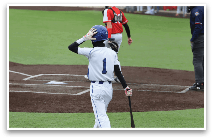 A baseball player is holding a bat and wearing a blue helmet. AI generated content