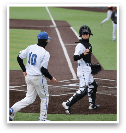 Two baseball players wearing number 10 and 11 walk on the field. AI generated content