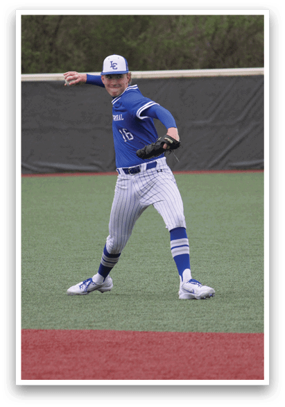 A baseball player in a blue uniform is standing on the field, holding a baseball bat and getting ready to swing. AI generated content