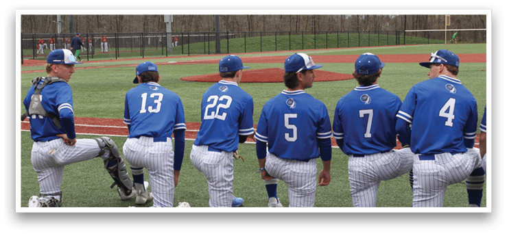 A group of baseball players in blue uniforms are kneeling on the field. AI generated content