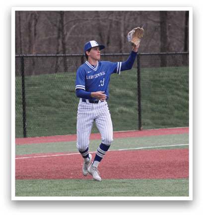 A baseball player in a blue and white uniform is jumping to catch a ball. AI generated content