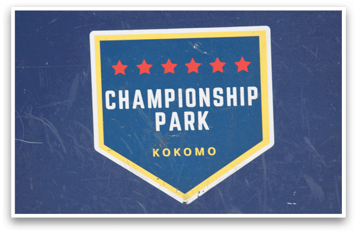 A blue and white sign with a logo for Championship Park in Cincinnati. AI generated content
