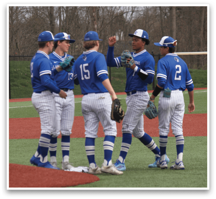 A group of baseball players wearing blue uniforms and blue hats are standing on a field. AI generated content