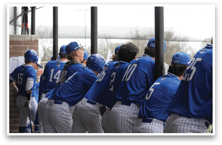 A group of baseball players wearing blue uniforms and blue helmets are standing in a line. AI generated content