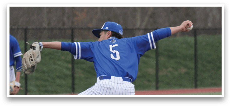 A baseball player in a blue and white uniform is in the process of throwing a ball. AI generated content