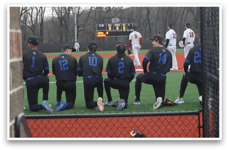 Baseball players in black uniforms kneeling on the field. AI generated content