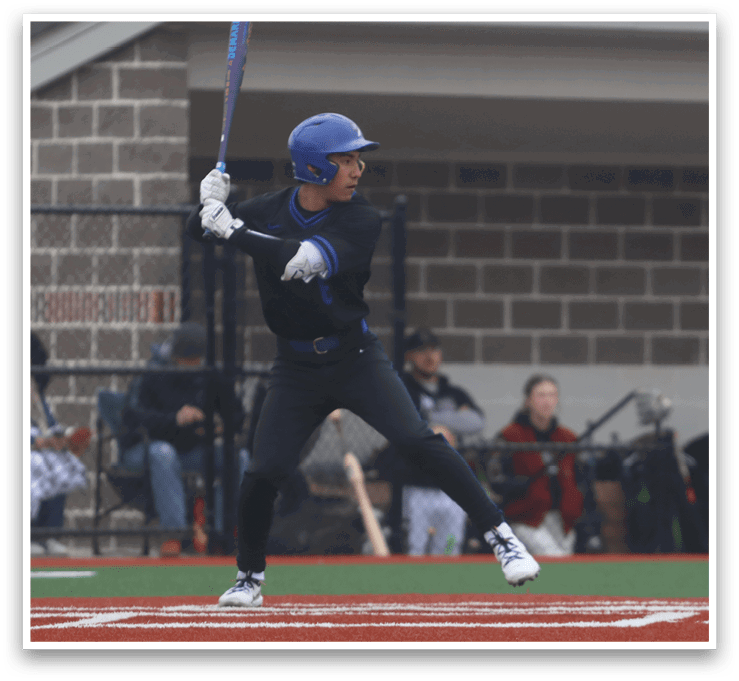 A baseball player in a blue helmet and black uniform is swinging a bat at a ball. AI generated content